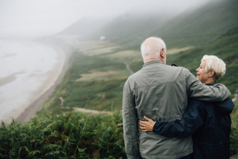 Happy senior couple enjoying a breathtaking view