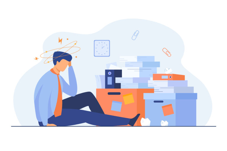 Tired man sitting on floor with paper document piles